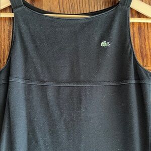 Women’s slightly worn black Lacoste pique dress.